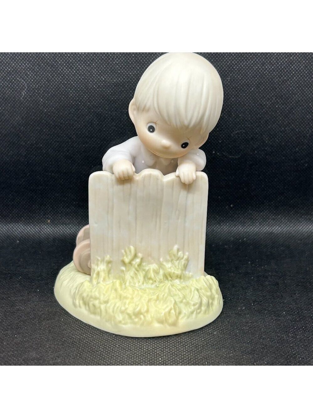 Precious Moments "It May Be Greener, But It's Just As Hard To Cut" figurine